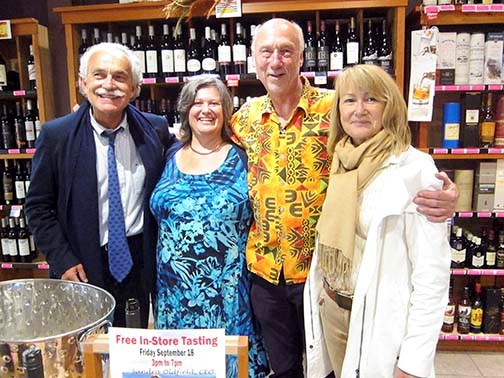 Gerard, left, and Marie Martinez, right, were the highest bidders for a two-night stay at Tinhorn Creek Vineyards at Friday’s Wine is Bottled Poetry fundraiser for the Bowen Island Arts Council. Making the presentation were event hosts Sandra Oldfield, CEO of Tinhorn Creek Vineyards, and Paul Rickett of the Bowen Beer & Wine Cellar.
