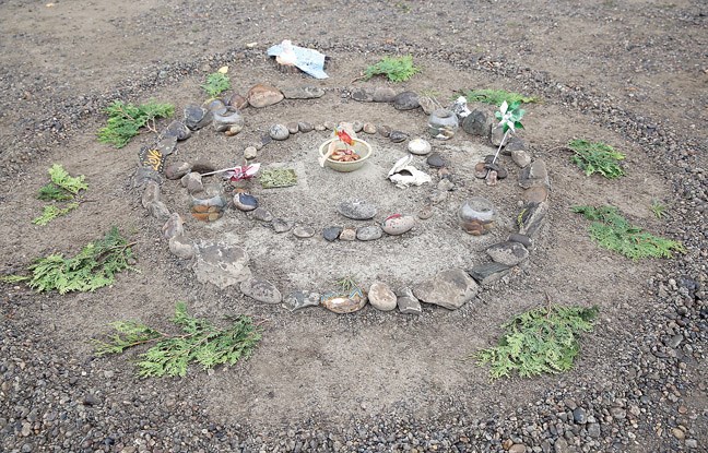 An alter was the focal point of the opening ceremony of the third annual Bank of Gratitude event held Sunday on the riverbank of the Fraser River as part of World Rivers and Culture Day.