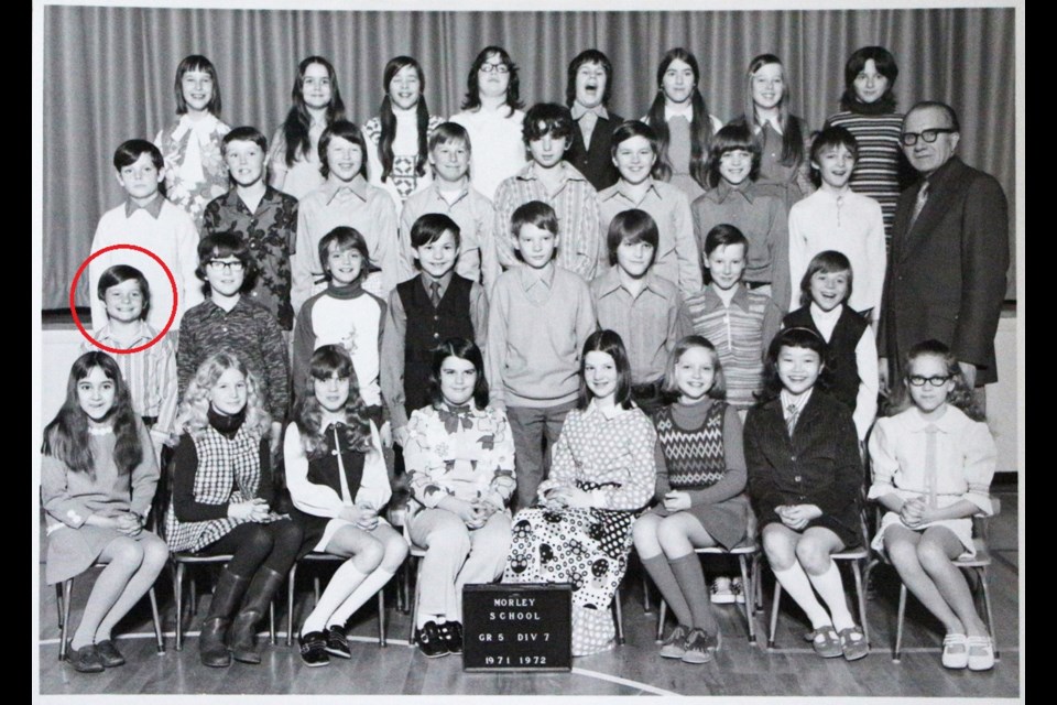 Future movie star Michael J. Fox poses for his Grade 5 Morley Elementary class photo in the early '70s. Morley's current school secretary is third from the right in the top row.