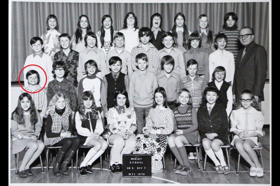 Future movie star Michael J. Fox poses for his Grade 5 Morley Elementary class photo in the early '70s. Morley's current school secretary is third from the right in the top row.