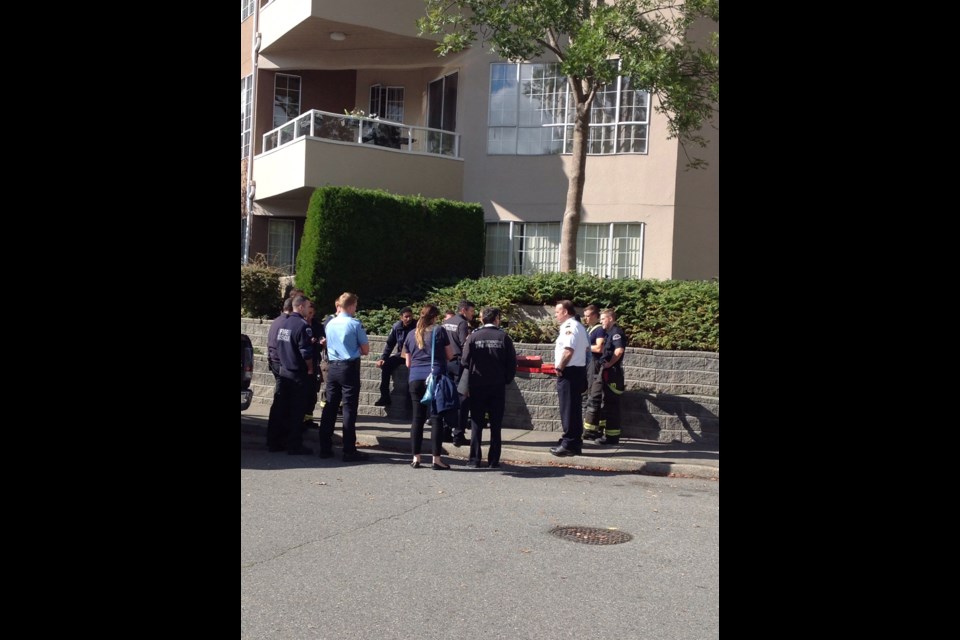 Firefighters gather after conducting an emergency drill on Quaysie Drive on Saturday, Sept. 26.