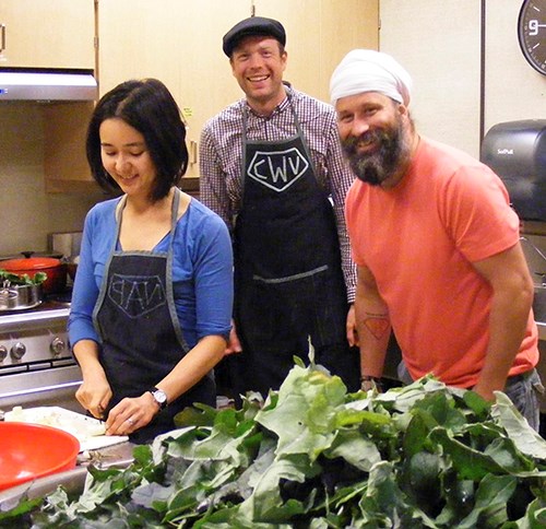 A pile of “Ragged Jack” kale grown by the Young Farmers of Bowen is ready for volunteers Nova Pon, Christiaan Venter and Qurban Singh Khalsa to turn into a salad for the hordes of hungry diners who filled the BICS gym on Friday night for the Bowen Grows feast.