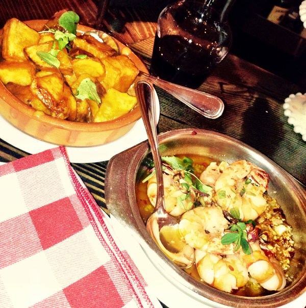 Patatas Bravas and gambas is one of the many tapas highlights at Bodega on Main.