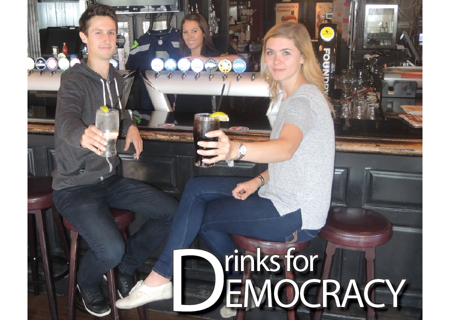 Daniel Ribi and Alex Lund-Murray with Ceili’s bar manager Lindsay Stewart. The students got so fed up with their peers failing to vote that they took matters into their own hands — by organizing a pub night for the federal election Photograph By Alan Campbell/Richmond News
