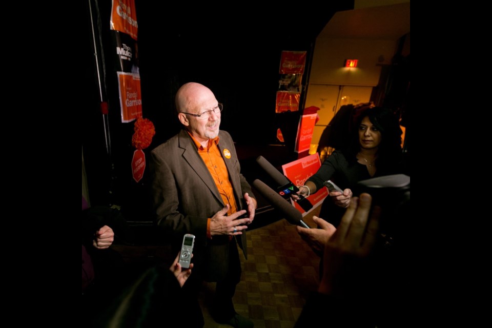 Randall Garrison talks to media at the Esquimalt Legion after his victory speech in 2015.