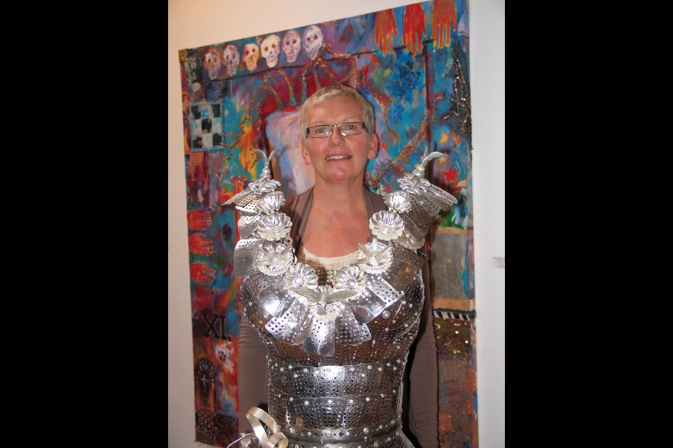 Impervious to arrows: metallic dress designed and fabricated by Tam Harrington.