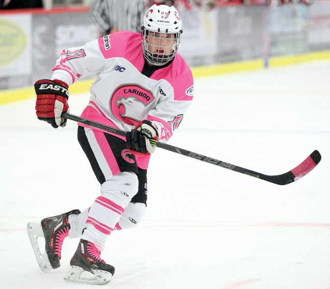 Ty Kolle takes a shot on goal as the Cariboo Cougars took on the South Island Royals in BC Major Midget hockey action on Sunday in Kin 1. The Cariboo Cougars were wearing special pink jerseys at their games Saturday and Sunday as part of a breast cancer research fundraiser.