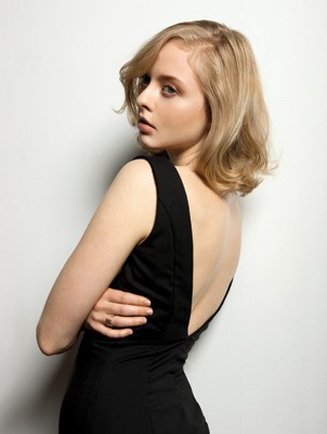 Black pencil dress with a deep V back from the Standing Armed fall-winter 2011 collection.