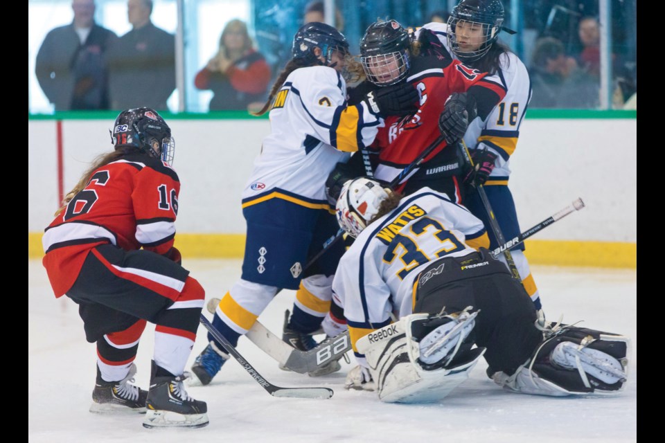 There was plenty of heated action in the fiercely competitive Bantam Division of the Pacific Coast Classic at the Richmond Olympic Oval including this game between Alaska and eventual silver medalist Richmond Ravens.