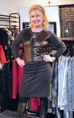 Jacqui Brownridge wears an InWear sequined cardigan and grey skirt with Michael Kors boots at the Marilyn's Anniversary of Style event Oct. 24 at Marilyn's Boutique in Caulfeild Village.