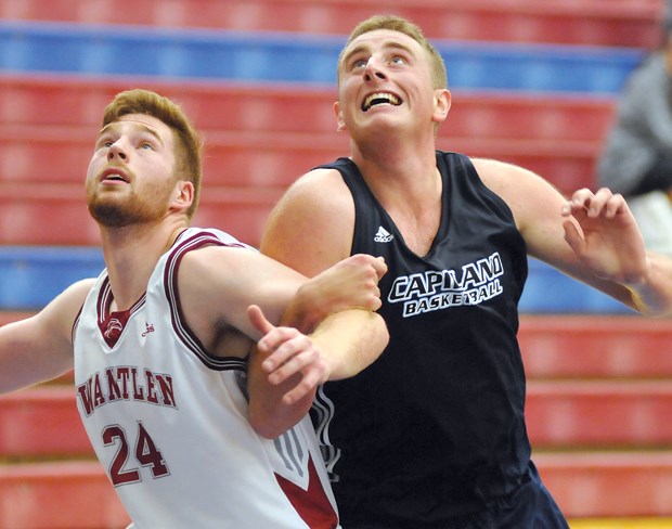 Chris Loreth (right) of the Capilano Blues battles a Kwantlen player during exhibition action. The young Blues were on fire in preseason play, posting an 8-1 record, and will look to stay hot when the regular season begins this weekend.