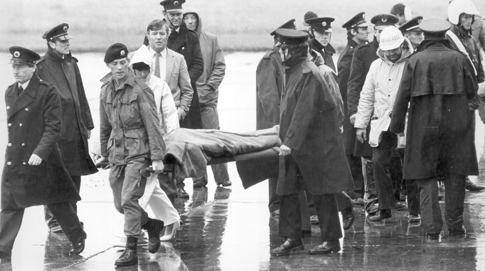 A victim of the Air India bombing which killed 329 people on June 23, 1985, is removed from Cork Air