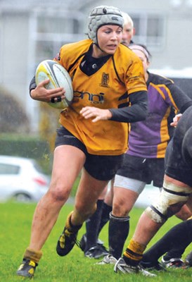 Capilano Rugby Club women's Lower Mainland Tier 1 team (yellow) in action against Kamloops (purple).
