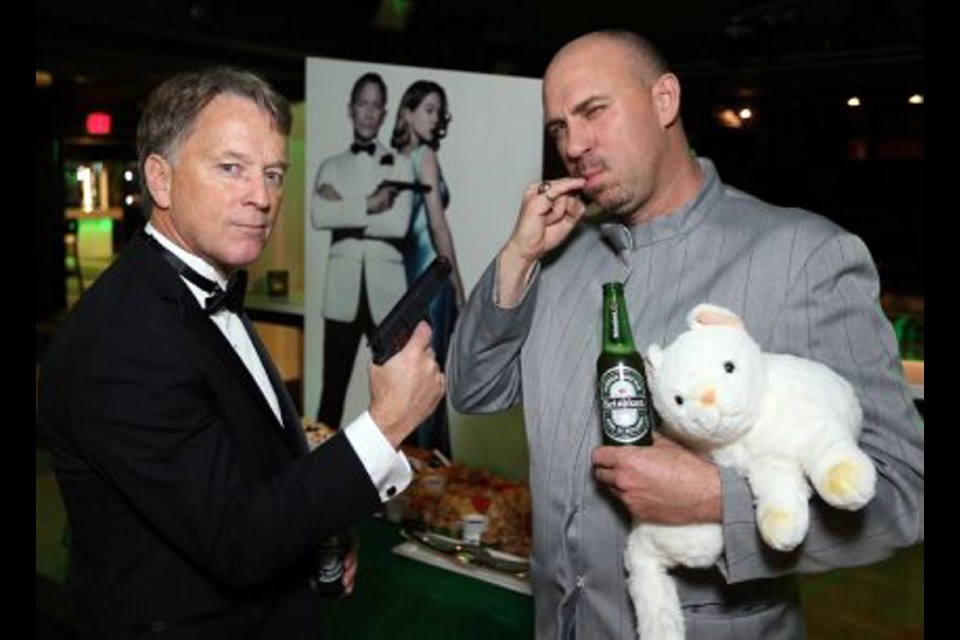 Grant Olson, left, and Brent Dobbie ham it up at Distrikt as James Bond and Ernst Stavro Blofeld (or is it Dr. Evil?).