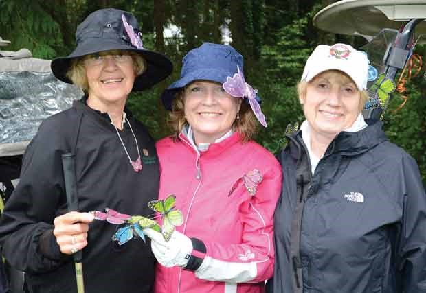 Shirley Kitchen and Jody Tomkins flank Wendy Frisby.