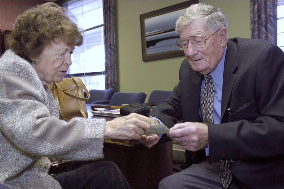 Gwyneth Brazier and Orme Payne reunited in 2002 in the Courier's office. Brazier thought Payne died on the beaches in Normandy. Photo Dan Toulgoet