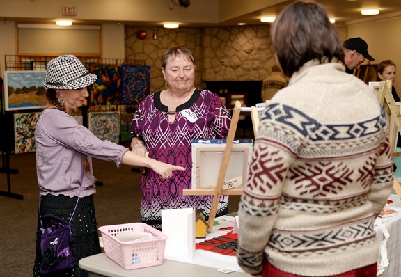 Artist Janet Kvammen and New West Artists president Julia at the group’s annual fall art show and sale at Shadbolt Centre on Nov. 7.