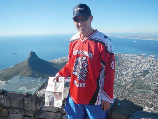 Jim Caruth takes the North Shore News to the top of Table Mountain overlooking the city of Cape Town in South Africa.
