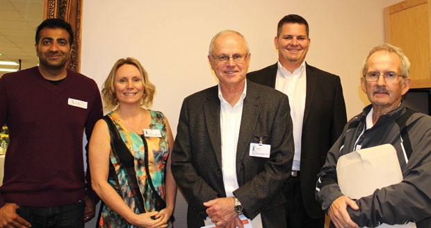 The Reach Foundation board includes (from left) Bob Mann, Barb Wallick, Tom Siba, Jeff Scott and Norman Stark. Missing are Tanya Corbet, Katherine Bamford, Valerie Bartlett, Denis Horgan and Agnes Douglas.