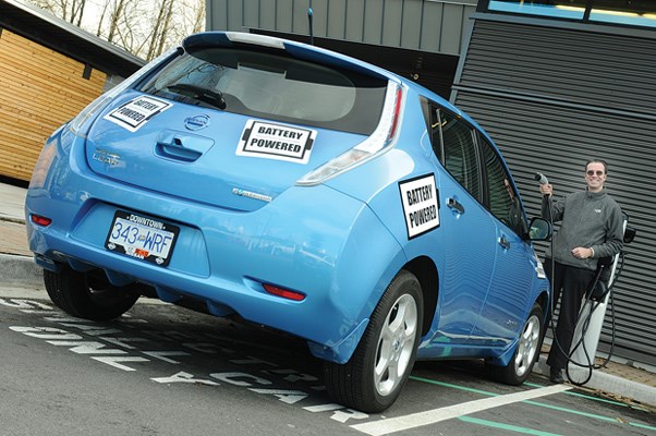 Robert Shaw, treasurer of the Vancouver Electric Vehicle Association and owner of a Nissan Leaf is eager to show off his EV. Other than a lack of a tailpipe, there isn't much to let you know the vehicle runs on electricity alone, so Shaw plastered his with "battery powered" magnets.