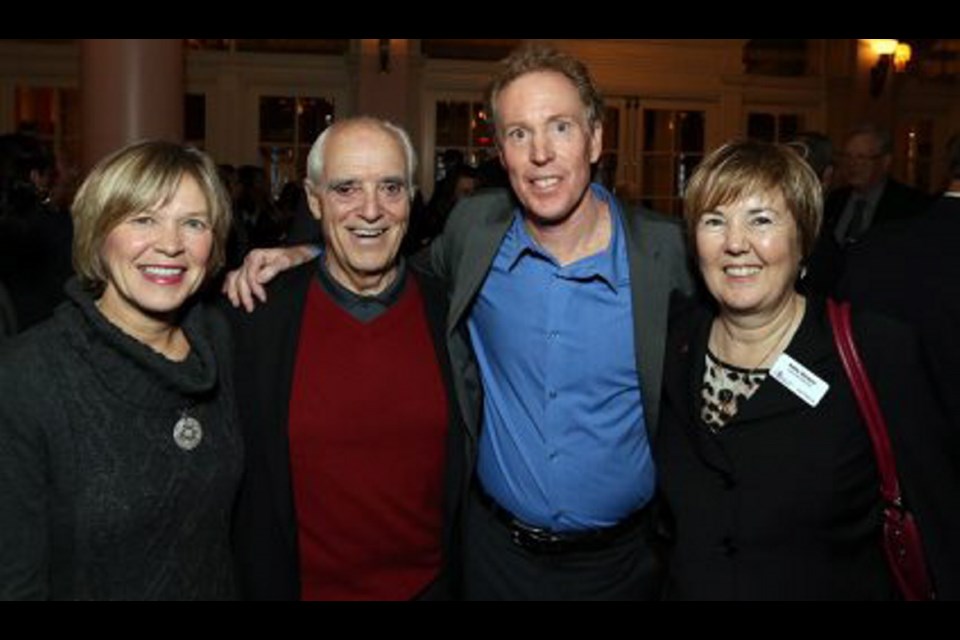 Joan Geber, left, Keith Dagg, award-winner Rob Reid and Kathy Stinson, Victoria Cool Aid Society executive director.