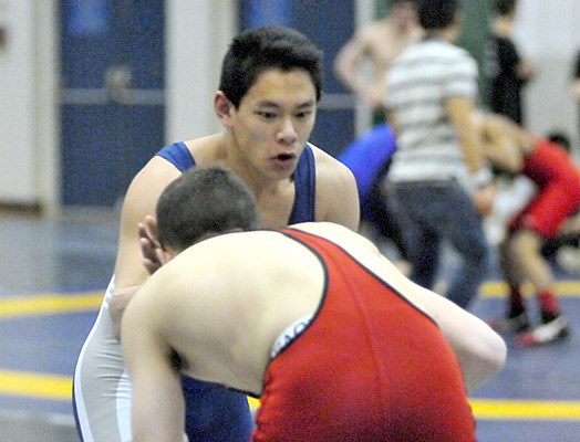 Sentinel's Eugene Chung (blue).