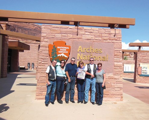 Peter and Sandra Anderson, Tony and Mary Ann Skeans, and Bernard and Cathy Favreau visit Arches National Park in Utah.