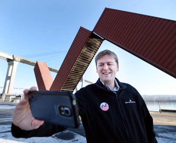 Mayor Jonathan Cote takes a selfie at the opening of WOW New Westminster