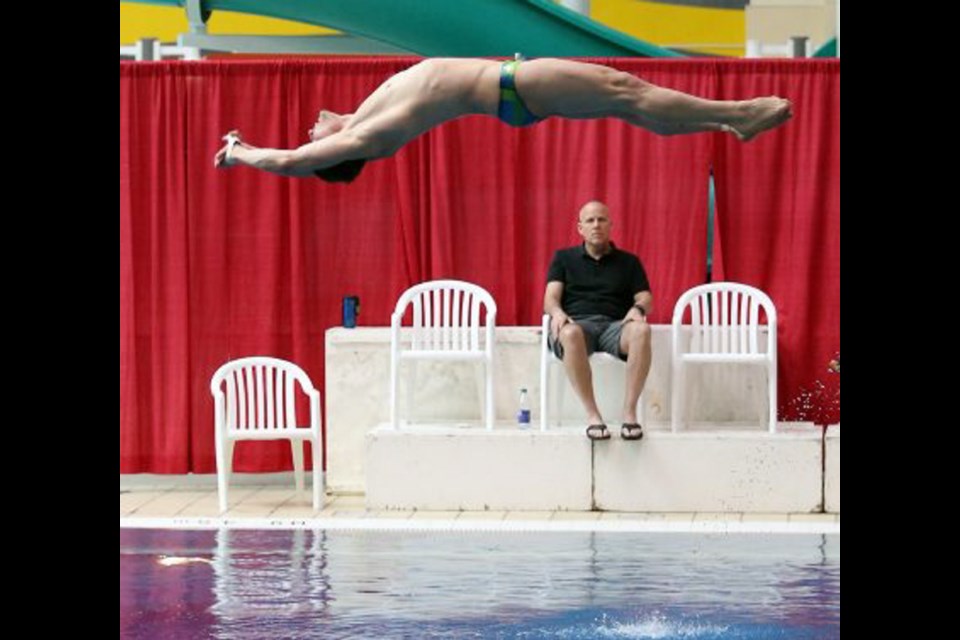 Senior national diving team member Cody Yano of Edmonton appears to be levitating at Saanich Commonwealth Place during preparations for the Pan Am Games trials in May.