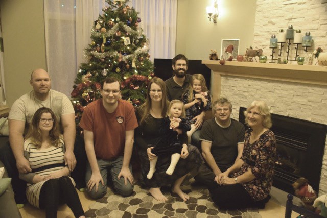 The Evans family, Chris, far right, with husband Nigel, welcome their New Zealand-based son-in-law Vaughan Colyer, far left, with his wife, Jennifer, who was born and raised in Richmond. The family held an early Christmas dinner on Sunday before the Colyers had to fly home to New Zealand.