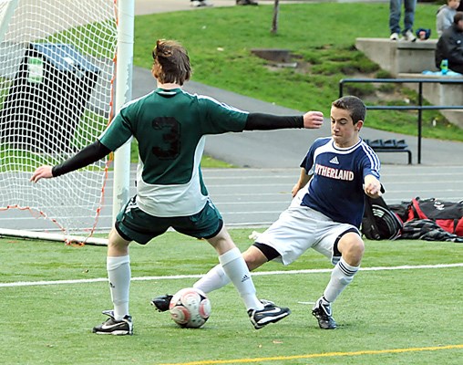 Argyle (green ) versus Sutherland (blue ) in Junior Soccer Final held at Sutherland.