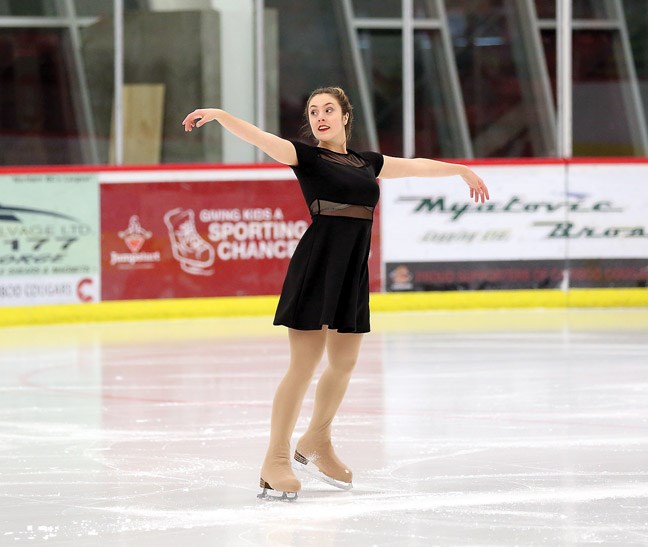 Olivia Jenaway, 17, performs in Kin 1 on Friday. The Prince George Figure Skating Club held their annual Santa Skate with performances by all the skaters in the club, followed by a family skate with Santa. Citizen Photo by James Doyle December 11, 2015