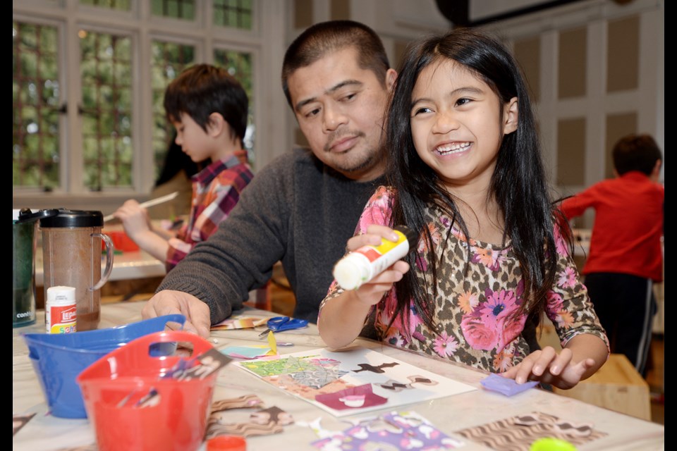 Six-year-old Alondra and Jon Colinares create some art at the Burnaby Art Gallery's In the BAG session.