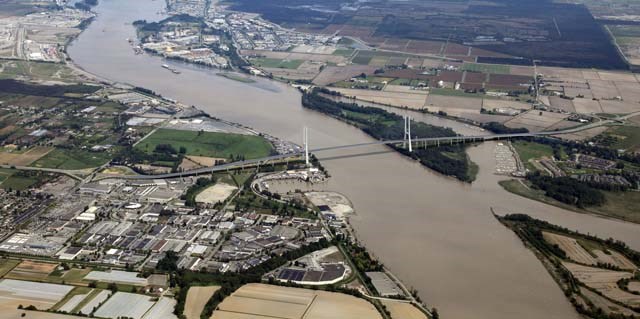 A rendering of the scale of the proposed $3.5 billion bridge across the south arm of the Fraser River, above the soon-to-be decommissioned Massey Tunnel. The bridge, at 3.5 kilometres long, will be the biggest of its kind in the province.