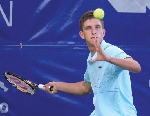 North Vancouver native Filip Peliwo lines up a shot during the Odlum Brown VanOpen at Hollyburn Country Club. Peliwo's dream season, which included two junior Grand Slam titles and the No. 1 ranking in the world, makes him the top North Shore sports story of 2012.