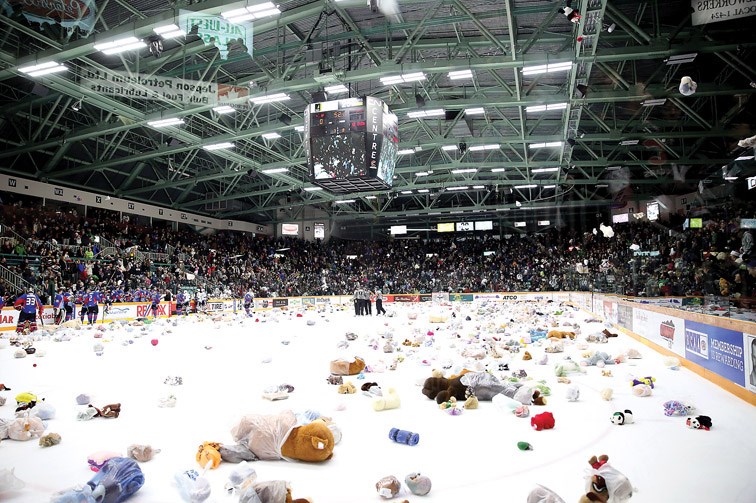 It was the annual Teddy Bear Toss night at CN Centre on Saturday. After Shane Collins goal with 5:21 remaing in the first period, all 5540 fans in attendance filled ice with stuffed bears, gloves, toques, and blankets with all items donated being distributed to those in need. Citizen Photo by James Doyle December 19, 2015