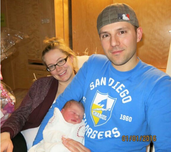 David and Kayla Bajic sit with their new daughter Ellie on Friday. Ellie was born at 1:25 a.m. and is Prince George's first baby of 2016.