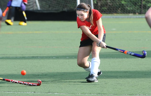 Carson player clears the ball.