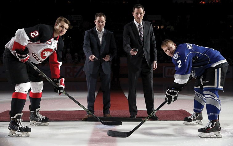 From left, Prince George Cougars Sam Ruopp, Cougars alumni Dr. Jeff Zorn, Cougars alumni Eric Brewer, and Victoria Royals Joe Hicketts take part in a ceremonial faceoff on Saturday at CN Centre. Dr. Zorn, and Brewer were both presented with WHL Alumni Achievement Awards in a ceremony prior to the game. Citizen Photo by James Doyle January 9, 2016