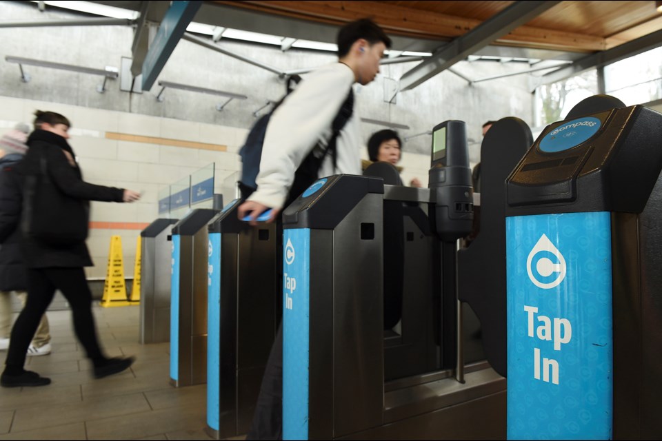 Two weeks after the Compass Card went into full effect, some users find it convenient, while others have deemed the new fare system confusing. Photo Dan Toulgoet.