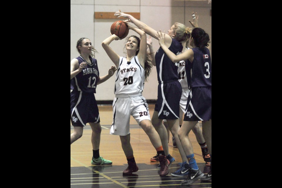 New Westminster's Madisen Obrovac, centre, aims for the hoop during a recent game. The Hyacks finished second at the Archbishop Carney Classic senior girls basketball tournament.