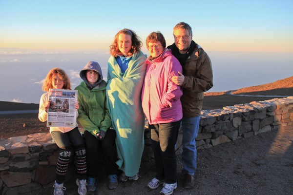 Sarah, Emma, and Margaret Berton, Cathie Hurlburt and Michael Berton shiver at sunrise with the North Shore News at the 3,055-metre peak of Haleakala volcano in Maui.