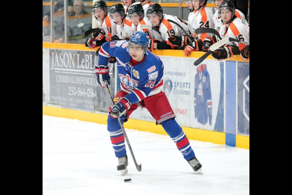 Prince George Spruce Kings Connor Logan looks for an open teammate on Thursday at the Coliseum. The Trail Smoke Eaters were in town to take on the Spruce Kings in regular season BCHL hockey action. Citizen Photo by James Doyle January 14, 2016