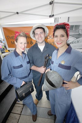 North Vancouver Museum and Archives' Kelsey Beaudry, Darius Burbidge and Charity Spencer dress as shipyard workers of yore.