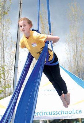 Christine Beyleveldt of the Vancouver Circus School performs on the silks.