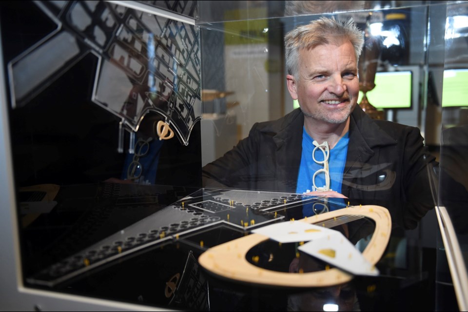 Bruce Haden poses with HCMA Architecture + Design’s proposed recreational platform in Coal Harbour called 'Can we get closer to the water.' Photo Dan Toulgoet