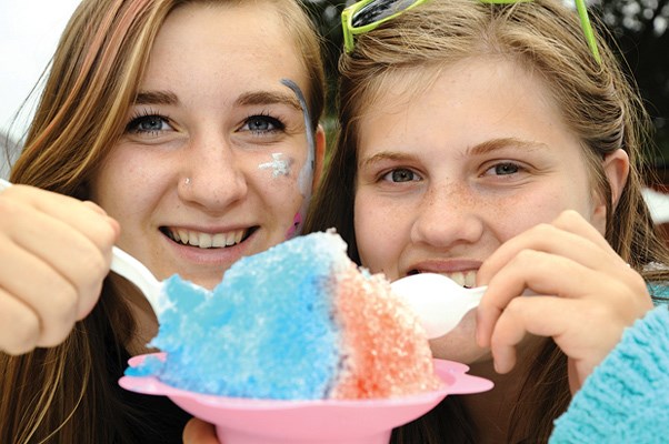 10th grade Seycove students Rachel Breckner and Alana Weafer volunteered during the festival and took time out to share a snow cone creation.
