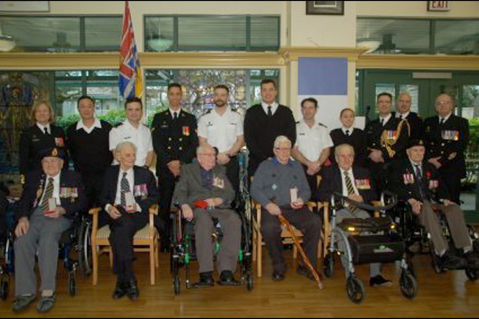 Six Veterans Memorial Lodge residents — front row, from left, Earl Clark, Philip Jeffrey, Geoff Lesueur, Ken Parton, Bill Capek and Jack Porter — received the Legion of Honour, France's highest decoration, for their efforts to liberate the country during the Second World War.