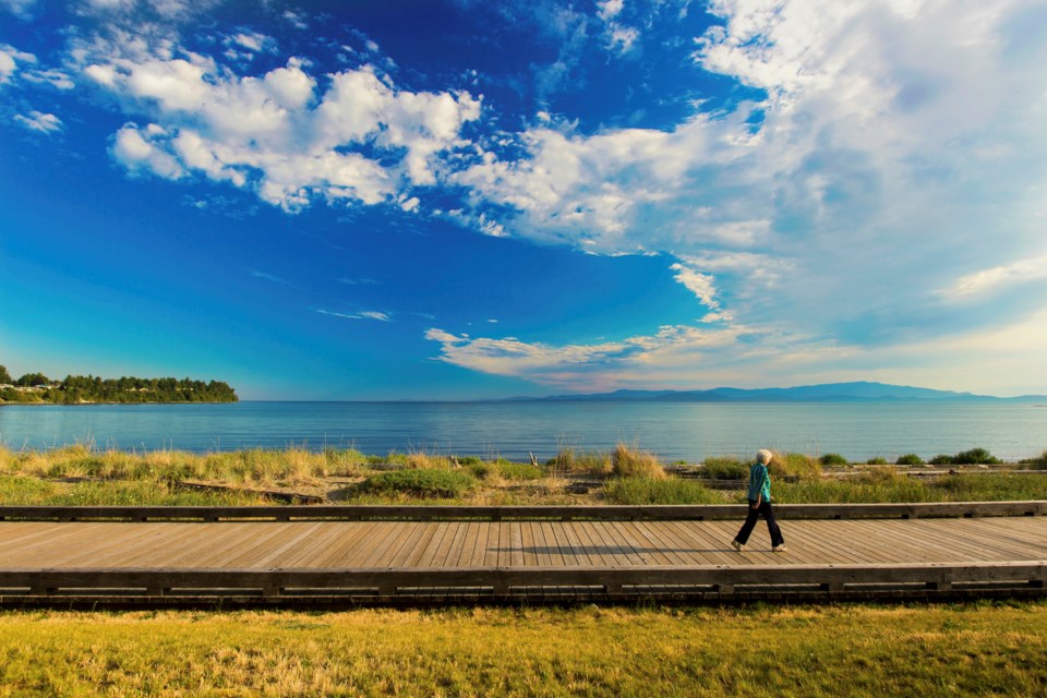 A boardwalk stretches alongside the Beach Club Resort in Parksville.