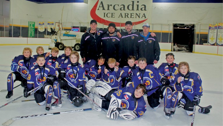 The Atom team went undefeated in the round robin and took silver in the semi-finals.